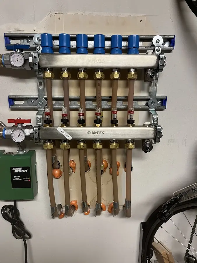 Plumber performing Gas Leak Detection at a residential property in Kiel